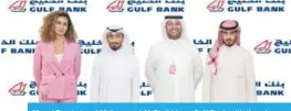  ??  ?? Manal Barakat and Mohammad Al-Otaibi from Gulf Bank with the winners