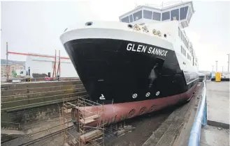  ?? Photograph­s: Mark Gibson Digital ?? The MV Glen Sannox’s bulbous bow has been removed in dry dock at Greenock.