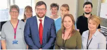  ??  ?? Teamwork Claire Farren (front, second from right) with fellow staff and Councillor Paul Kelly, chair of H&SCNL Integratio­n Joint Board, who visited the project