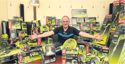  ?? Picture: Dougie Nicolson. ?? John Starkey surrounded by the tools he won, all of which he says will be put to good use.