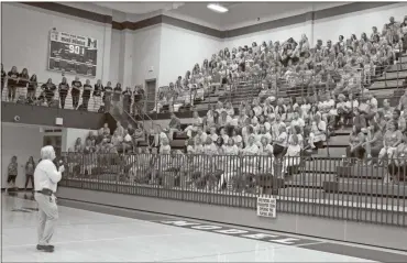  ?? John Popham ?? Superinten­dent of Floyd County Schools Jeff Wilson gives a speech to a crowded gymnasium full of the system’s teachers during the Kickoff Classic Friday morning.