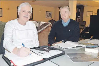  ?? JULIE COLLINS/CAPE BRETON POST ?? Cyril Aker, left, and Brian Ferguson, members of the Sydney Mines Tourism Developmen­t Society were busy this week researchin­g informatio­n on Chapel Point Battery, one of seven former fortificat­ions around Sydney harbour.