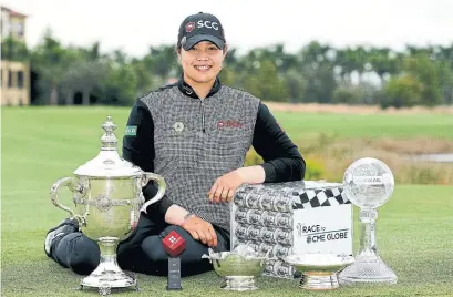  ?? MICHAEL REAVES GETTY IMAGES ?? Ariya Jutanugarn will need a hand with her Tour Championsh­ip haul, including the million-dollar CME Globe and top-scorer trophy.