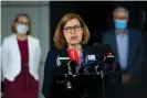  ?? Photograph: Bianca de Marchi/AAP ?? NSW chief health officer Dr Kerry Chant speaks to the media during a press conference at Lidcombe public school in Sydney on Sunday. She has urged parents not to send symptomati­c children to school.