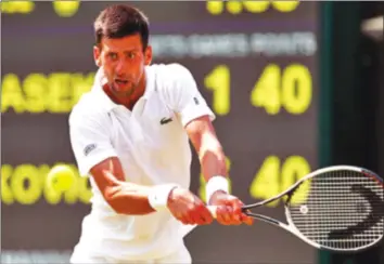  ??  ?? Novak Djokovic overcame an injury scare to reach Wimbledon quarter-finals for the ninth time yesterday