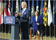  ?? KASTER/ THE ASSOCIATED PRESS] [CAROLYN ?? Democratic presidenti­al candidate former Vice President Joe Biden, joined by his running mate, Sen. Kamala Harris, D-Calif., speaks during a campaign event Wednesday at Alexis Dupont High School in Wilmington, Del.