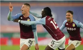  ??  ?? Ross Barkley celebrates with Bertrand Traoré and Matty Cash after firing the winner for Aston Villa against Leicester in stoppage time. Photograph: Jon Super/Reuters