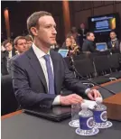  ?? JACK GRUBER/USA TODAY ?? CEO Mark Zuckerberg, 33, arrives to testify Tuesday on Capitol Hill. He said he was “committed to getting this right.”