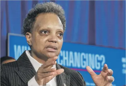  ?? PAT NABONG/SUN-TIMES ?? Mayor Lori Lightfoot says Wednesday of search-warrant policy, “We are going to get this right.”