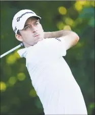  ?? Michael Reaves / Getty Images ?? Nick Taylor plays his shot from the sixth tee during round two of the Fort Worth Invitation­al at Colonial Country Club on May 25 in Texas.