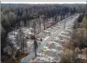  ?? ?? Homes leveled by the Camp Fire line the Ridgewood Mobile Home Park retirement community in Paradise on Dec. 3, 2018.