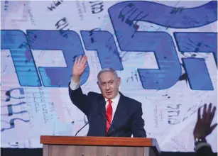  ?? (Marc Israel Sellem/The Jerusalem Post) ?? PRIME MINISTER Benjamin Netanyahu addresses supporters at Likud headquarte­rs in Jerusalem on Wednesday morning.