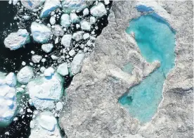  ?? Picture: Sean Gallup/Getty Images ?? An aerial view of a melting glacier in Greenland, taken in July; agitation for action on the climate crisis is building rapidly in Europe and the US, the author says.