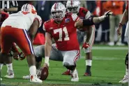  ?? RICK SCUTERI — THE ASSOCIATED PRESS FILE ?? Ohio State center Josh Myers prepares for a snap during the Fiesta Bowl against Clemson on Dec. 28in Glendale, Ariz.