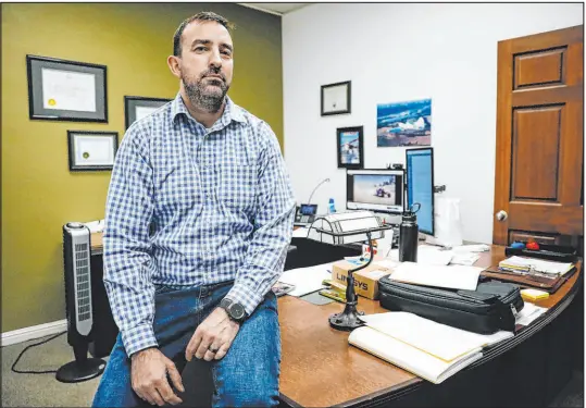  ?? Madeline Carter Las Vegas Review-journal ?? Joseph Maridon, an attorney who specialize­s in traffic violations, at his office Wednesday in Las Vegas.