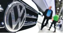  ?? JOHN MACDOUGALL/AFP/GETTY IMAGES ?? Volkswagen will pay the 105,000 Canadian owners and lessees of 2-litre Volkswagen and Audi diesel vehicles between $5,100 and $8,000 each in damages.