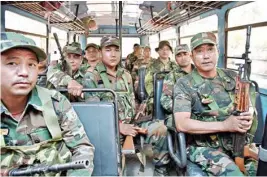  ?? PTI ?? Paramilita­ry personnel with their arms and ammunition ready to leave for their respective polling stations in Maoist affected areas of Jharkhand on the eve of Ranchi Municipali­ty Elections in Ranchi on Sunday