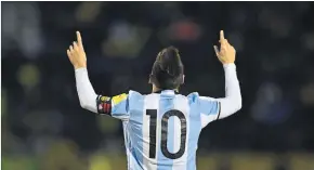  ?? [ Reuters] ?? Argentinie­n atmet auf, es wurde von Lionel Messi befreit.