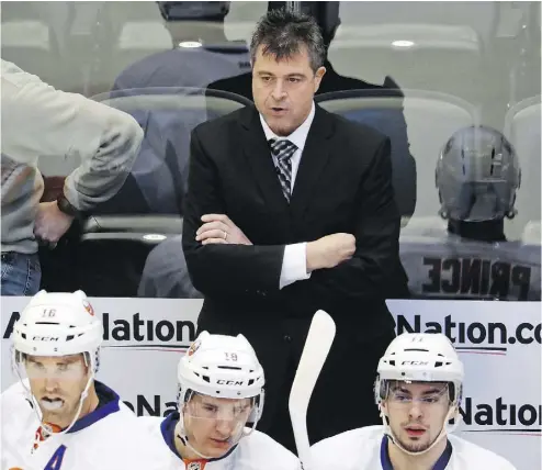  ?? DAVID ZALUBOWSKI / THE ASSOCIATED PRESS FILES ?? The New York Islanders fired head coach Jack Capuano after a disappoint­ing first half of the season. Many predicted that the Islanders would be a playoff team, but instead they sit dead last in the Eastern Conference.