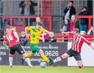  ?? ?? Josh Kelly was unable to make inroads against Altrincham's defence in Saturday's 2-0 defeat. Photo by George Tewkesbury.