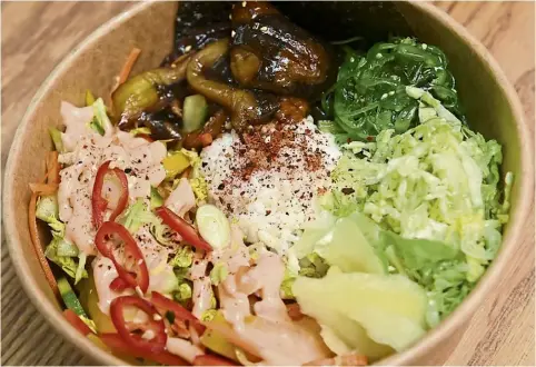  ?? ?? HEALTHY AND FRESH: Vegan dishes can offer up a whole new set of flavours, below left, chef at Salt N Fire Anthony Khoury and right, Lara Elsayed, co-owner of the Inverness takeaway.