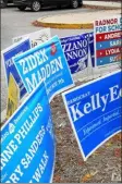  ??  ?? Don’t look now, but those pesky campaign signs are about to return with a vengeance. That’s a good thing - so is voting.