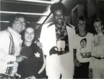  ?? BRIAN ZEMBIC PHOTOS, AP (WINSTON) ?? Bobby Riggs (left) and Don King (center) with a young Zembic (second from right).