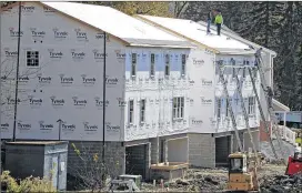  ?? GENE J. PUSKAR / ASSOCIATED PRESS ?? Sales of new U.S. homes are running ahead of last year’s pace, reflecting strong demand for homes as the economy has continued to create jobs. The unemployme­nt rate is at a 16-year low of 4.3 percent.