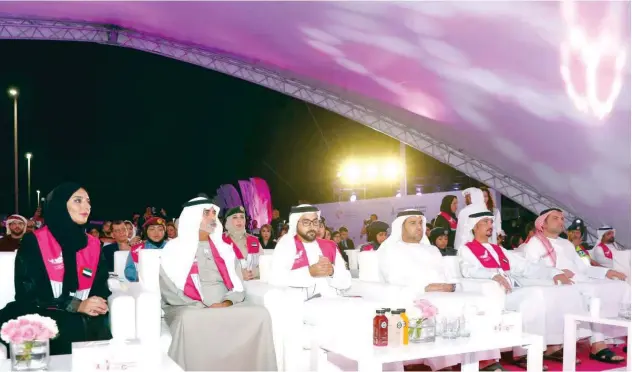  ??  ?? ↑
Sheikh Nahyan with dignitarie­s at the closing ceremony of the Pink Caravan in Abu Dhabi.