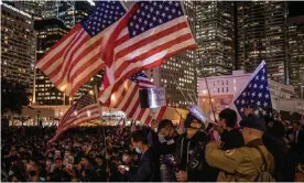  ??  ?? Pro-democracy protesters take part in a Thanksgivi­ng Day rally on Thursday night in Hong Kong to say thank you to Donald Trump. Photograph: Chris McGrath/Getty Images