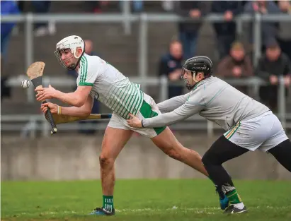  ?? SPORTSFILE ?? Aaron Gillane of Limerick taps home his side’s goal after geting the better of Offaly goalkeeper Conor Slevin