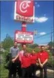  ?? PEG DEGRASSA — DIGITAL FIRST MEDIA ?? Team members of Chickfil-A in Ridley Township, left to right, Taylor Gonzales of Ridley Park, team leader Chad Kennard of Folsom, David Long of Morton, Kayla Kyle of Folsom and James McIntyre of Glenolden stand beneath the letterboar­d advertisin­g this...