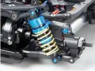  ??  ?? The suspension uses a pure racer TRF 418 type, and a high performanc­e TRF special damper is attached.