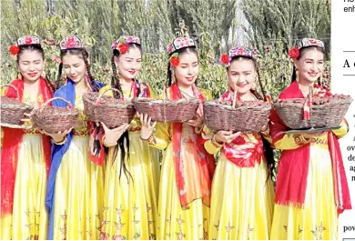  ??  ?? FAMOUS sites and specialtie­s of Xinjiang Uygur autonomous region are on display.