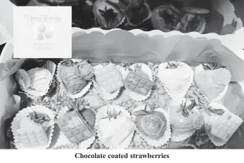  ?? ?? Chocolate coated strawberri­es