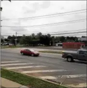  ?? DAN SOKIL — DIGITAL FIRST MEDIA ?? Drivers pass by the Lukoil fuel station and Wawa convenienc­e store on the northeast corner of Forty Foot Road and Sumneytown Pike on Thursday morning where an expanded Wawa fuel station and store was proposed the night before.