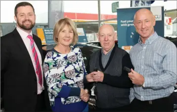  ??  ?? John O’Brien of Fitzpatric­k Motors and Bernie More of Bray Credit Union with winners David O’Neill and Billy Murphy.