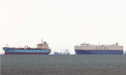  ?? Photograph: Khaled Elfiqi/EPA ?? Ships are anchored outside the Suez canal in Ain Shokhna, near Suez, Egypt, 26 March 2021.