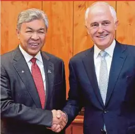  ?? BERNAMA PIC ?? Deputy Prime Minister Datuk Seri Dr Ahmad Zahid Hamidi with Australian Prime Minister Malcolm Turnbull in Canberra yesterday.