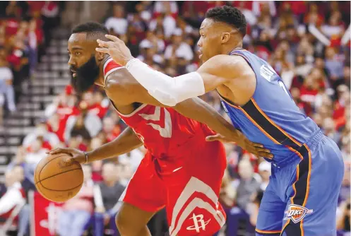  ?? AP FOTO ?? RUN. Russell Westbrook (right) led Oklahoma to a furious fourthquar­ter rally to beat Houston on their court.