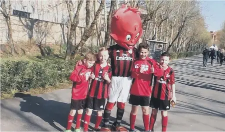  ??  ?? Dominic McCabe, second left, and Vinnie Owens, far right, with other youngsters in Milan last year.