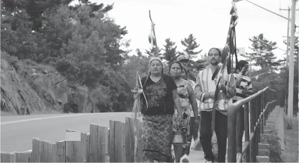  ?? SAMANTHA SAMSON / POSTMEDIA NEWS FILES ?? The Anishinaab­e Water Walk went through Kenora to protest the Energy East Pipeline because of what they feel it will do to their water in Kenora, Ont.