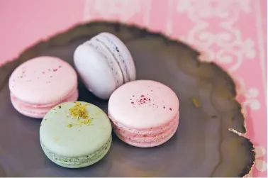  ?? PHOTOS BY OLIVIA HARLOW/THE NEW MEXICAN ?? Macaron flavors at Chainé include strawberry rosé with Gruet rosé, lemon lavender and roasted pistachio.