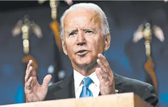  ?? ANDREW HARNIK/AP ?? Democratic presidenti­al hopeful Joe Biden believes the highest federal tax burden should fall on the wealthiest Americans.