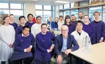  ??  ?? Winning team . . . Members of a University of Otago microbiolo­gy research team, led by Prof Greg Cook, front row, second from right, and including, in the front row, left to right, postdoctor­al fellow Dr Htin Aung, assistant research fellow Scott...