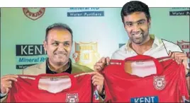  ?? PTI ?? ■ Kings XI mentor Virender Sehwag and captain R Ashwin unveil the team jersey on Tuesday.