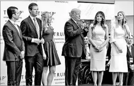  ?? CHERISS MAY/TRIBUNE NEWSPAPERS ?? New York’s lawsuit names President Donald Trump and three of his adult children, along with his charitable foundation.