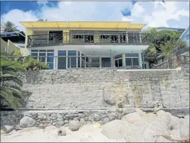  ??  ?? The bungalow on Clifton Third Beach to be auctioned as a part of a divorce settlement at the end of this month.