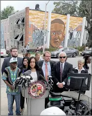  ?? AP/STEVE RUARK ?? “We do not believe Freddie Gray killed himself,” Baltimore State’s Attorney Marilyn Mosby said Wednesday at a news conference near the site where Gray, depicted in the mural in the background, was arrested.