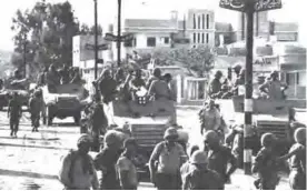  ??  ?? In this June 7, 1967 file photo, Israeli troops enter Gaza City in the Gaza Strip during the Six-Day War.